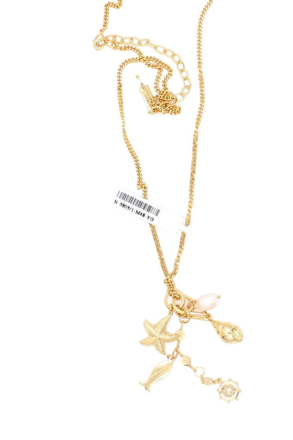 A gold-toned necklace with multiple charms, including a starfish, a small seashell, a pearl-like bead, and a rose, shown on a plain white background with a barcode tag attached.