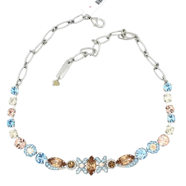 Necklace with multicolored beads on a white background