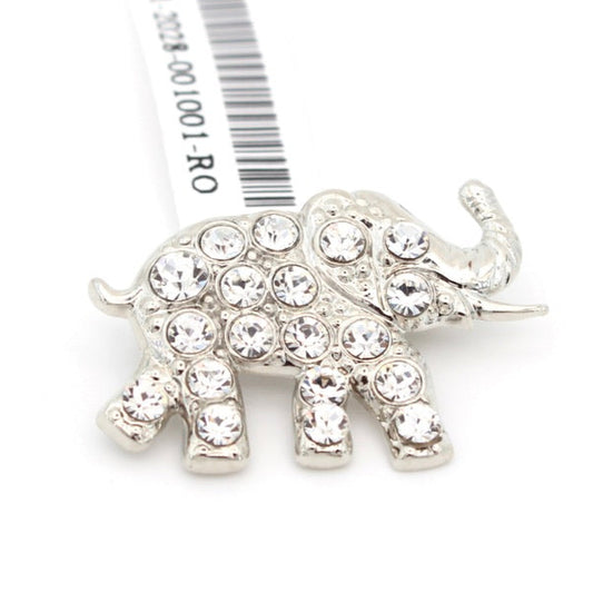 Silver elephant-shaped brooch with crystal details on a white background