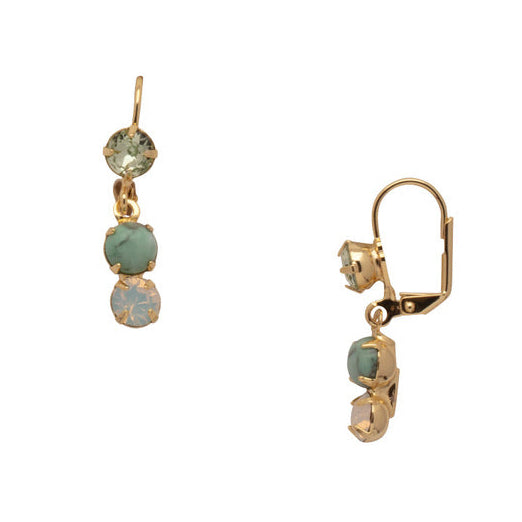Gold earrings with green gemstones on a white background