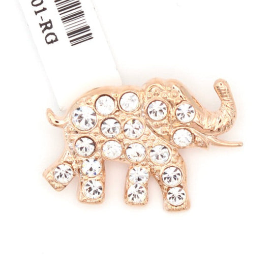 Gold elephant brooch with rhinestones on a white background