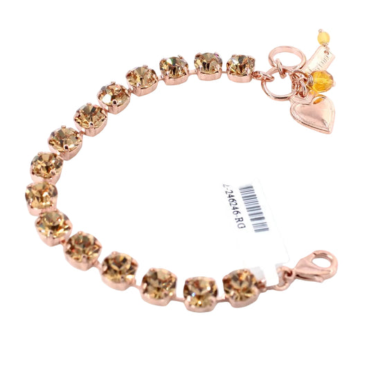 Bracelet with brown gemstones and heart charm on a white background