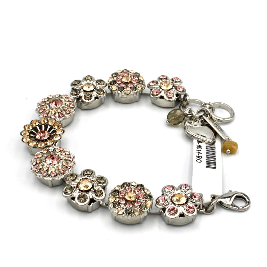 Bracelet with floral charm design on a white background