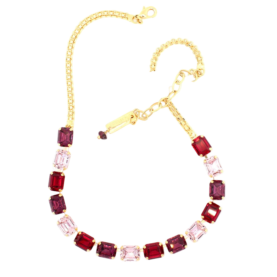 gold necklace with emerald cut red and pink crystals