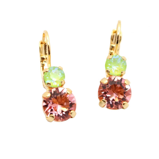 Gold earrings with multicolored gemstones on a white background