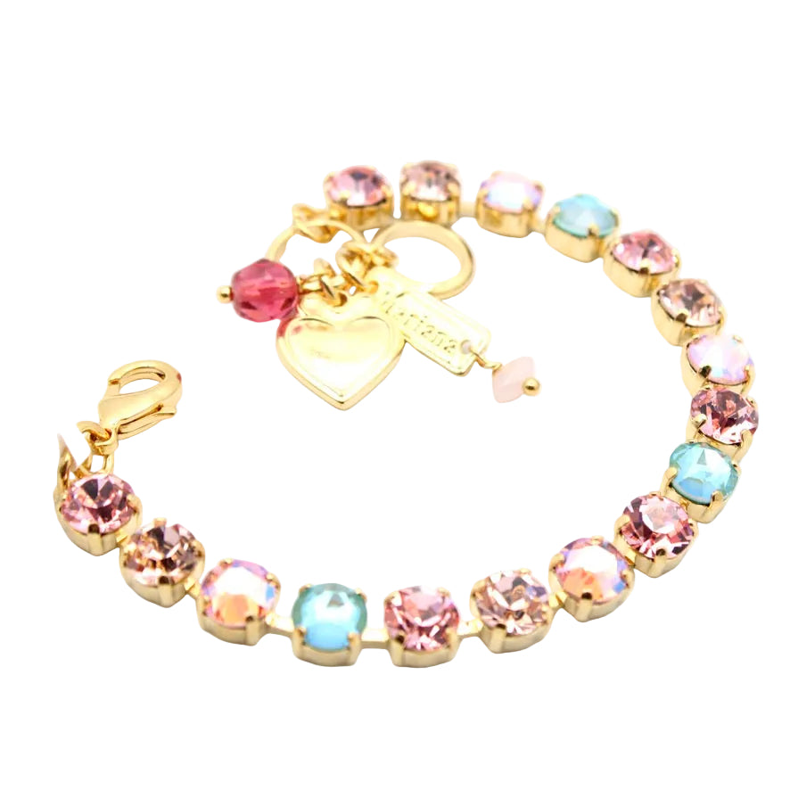 Multicolored beaded bracelet with gold charm on a white background