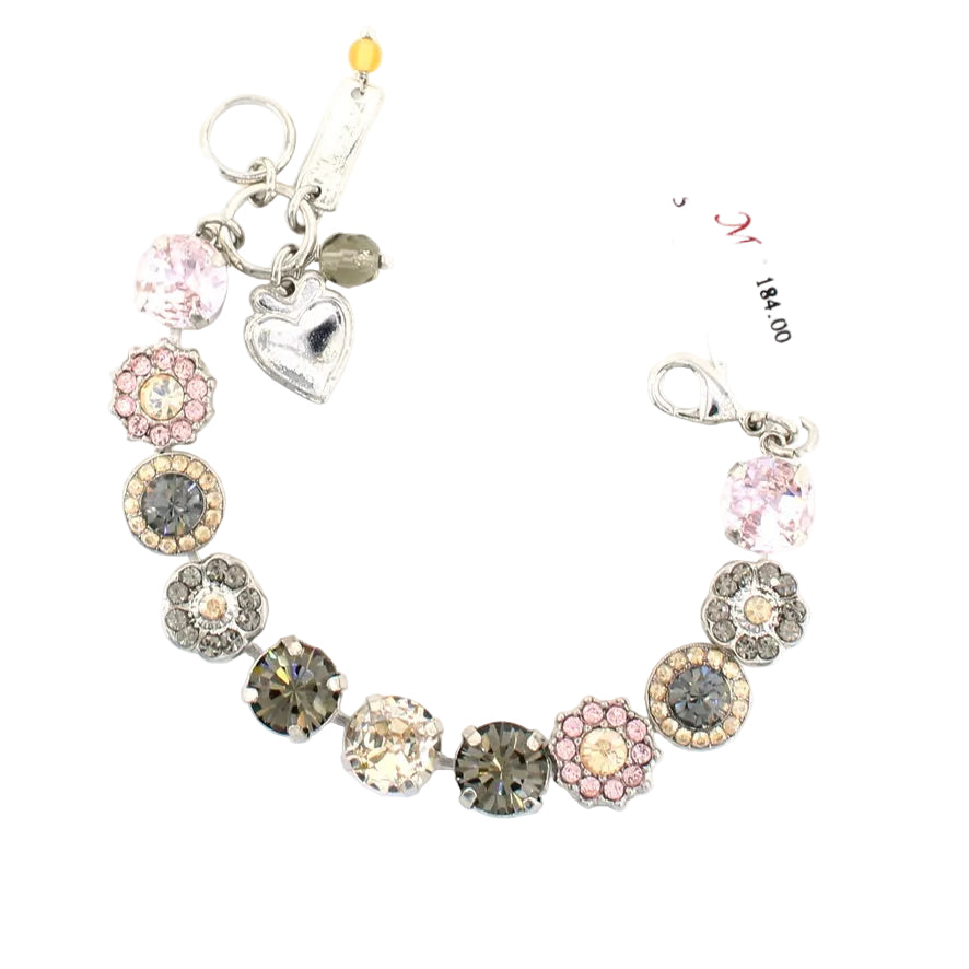 Decorative bracelet with floral and heart charms on a white background