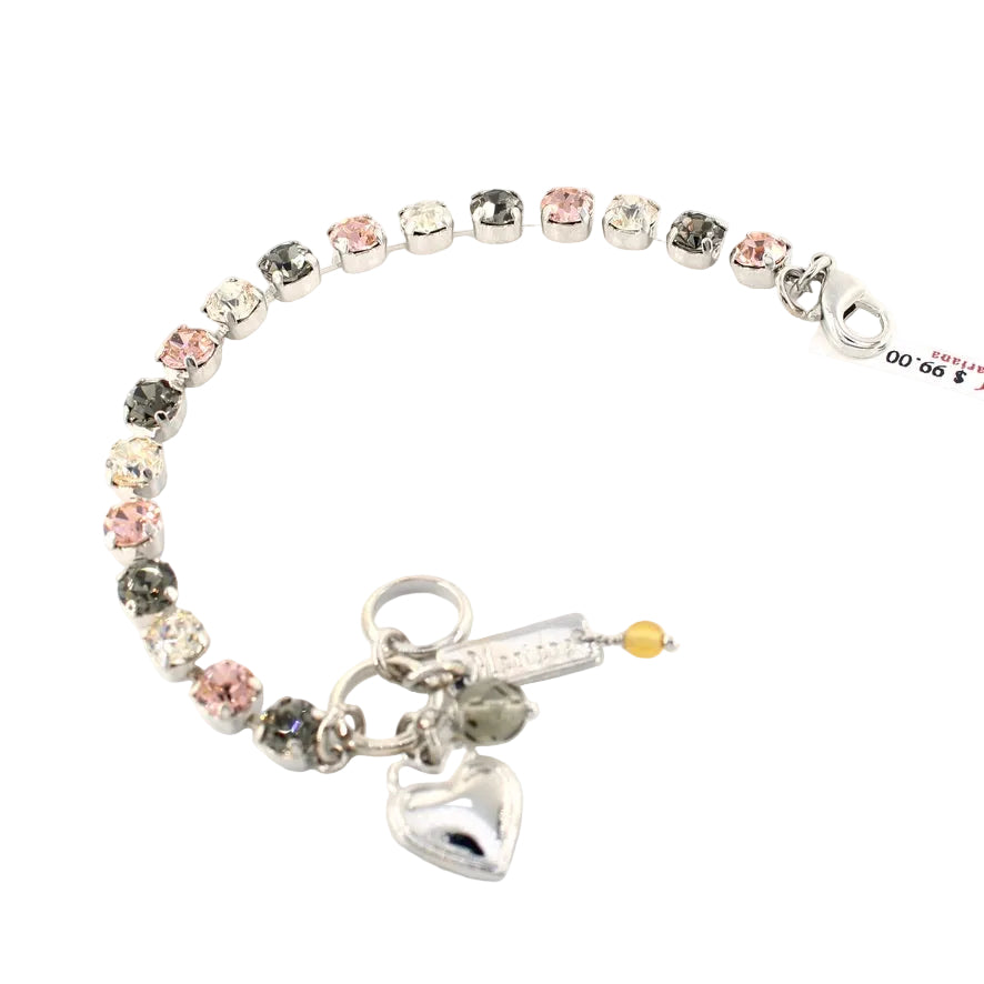 Bracelet with heart charm and multicolored beads on a white background