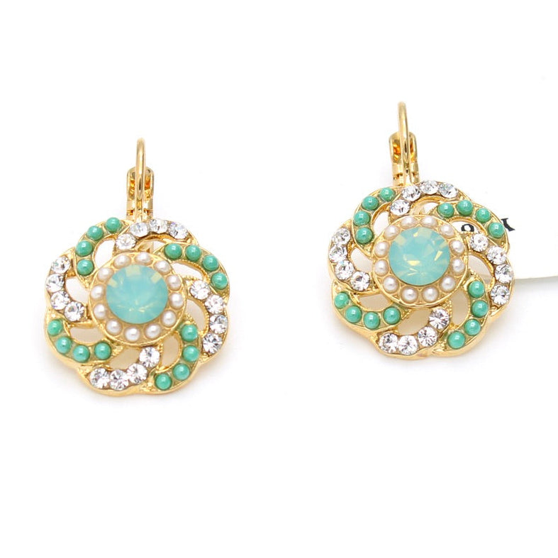 round swirl earrings with clear and turquoise in gold
