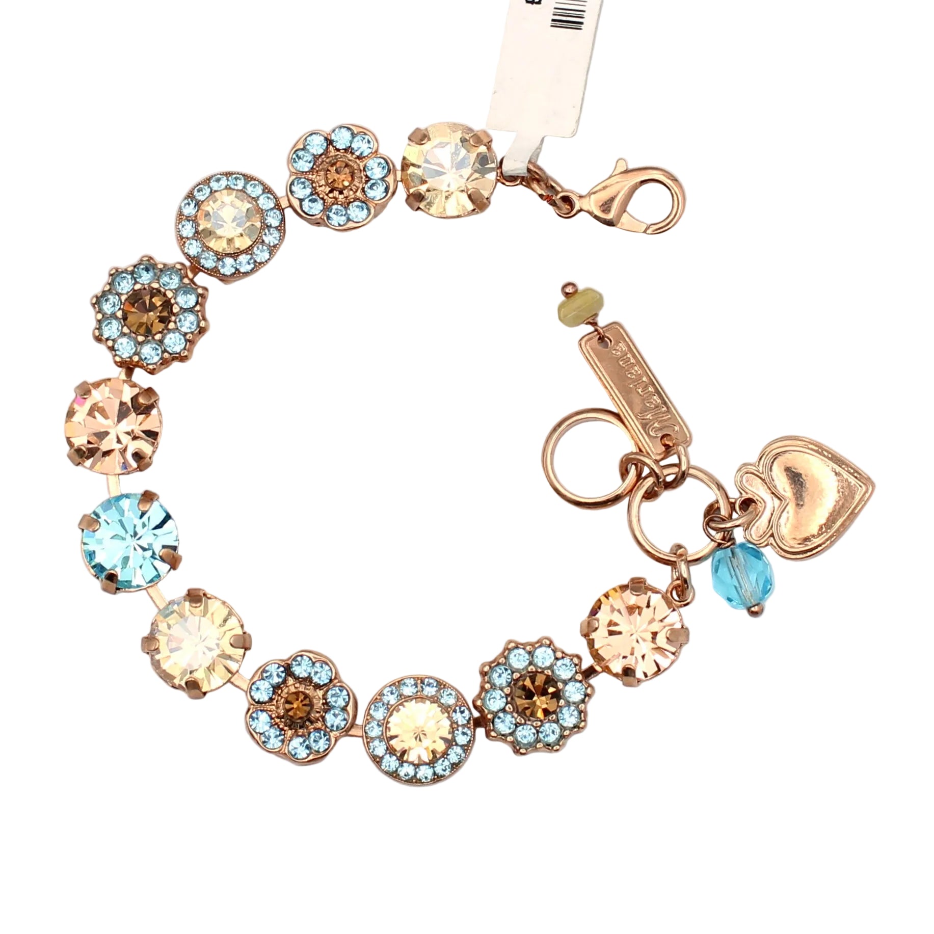 Bracelet with colorful gemstones and charms on a light gray background