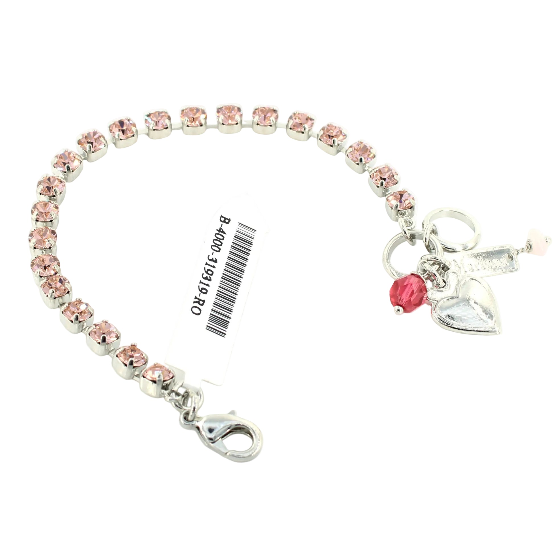 Bracelet with pink beads and heart charm on a white background